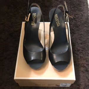 Black sling back Micheal Kors heels